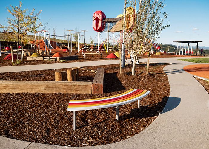 Mall Curved Slim Bench, battens in Pearl White, Safety Yellow, Sensation Orange and Lobster Red.