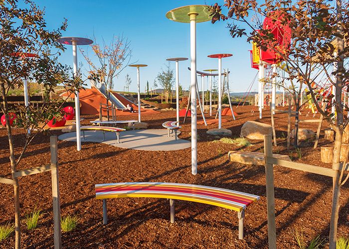 Mall Curved Slim Benches, battens in Pearl White, Safety Yellow, Sensation Orange and Lobster Red.