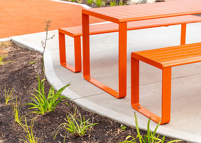 Linea Table (LIT10, 1800) with Linea Benches (LIB6, 1500) in Sensation Orange.