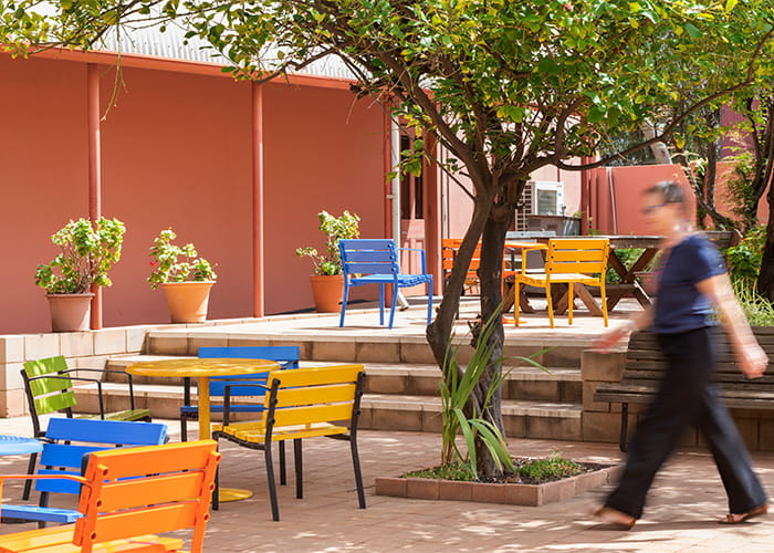 Forum Seats and Cafe Round Tables in Sunshine, Sensation Orange, Bondi Blue and Lycra Strip.