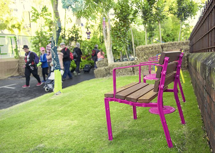 Telemagenta pink powder-coated Forum Seat frames and Cafe Stools.