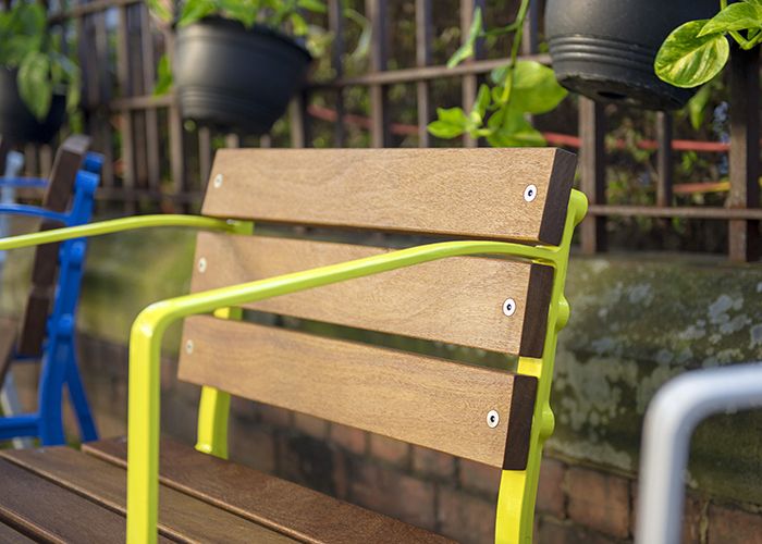 Forum Seat, with eco-certified hardwood battens and Brilliant Yellow frame.