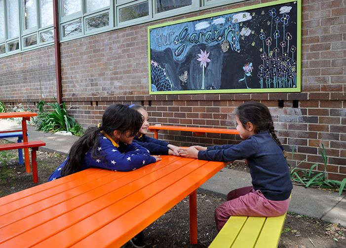 A place for learning outdoors, near the veggie garden and chicken coop.