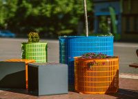 Linea Cubes and Frame Planter in aluminium Spotted Gum, Lycra Strip Green, Bondi Blue, Sensation Orange and Textura Monument.
