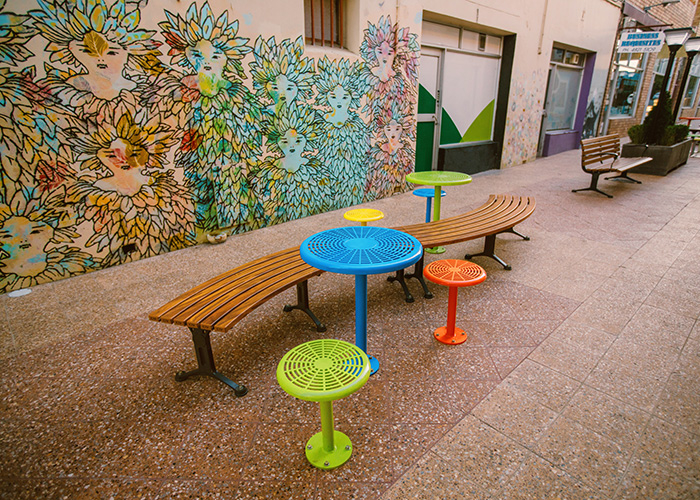Mall Curved Slim Bench (CMM8-C) with aluminium Spotted Gum battens, Textura Monument frame. With Cafe Macchiato Table and Stool in Brilliant Yellow, Bondi Blue, Sensation Orange and Lycra Strip Green.