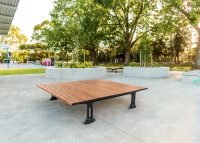 Mall Platform (CMM9) with aluminium woodgrain battens in Spotted Gum, Textura Monument frame.