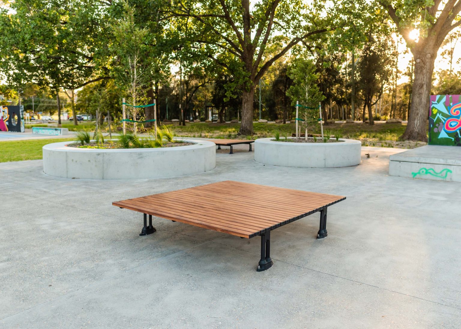 Mall Platform (CMM9) with aluminium woodgrain battens in Spotted Gum, Textura Monument frame.