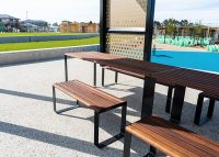 Linea DDA Table (LIT10-DDA, 2100mm) with Linea Benches, hardwood battens, Night Sky frame.