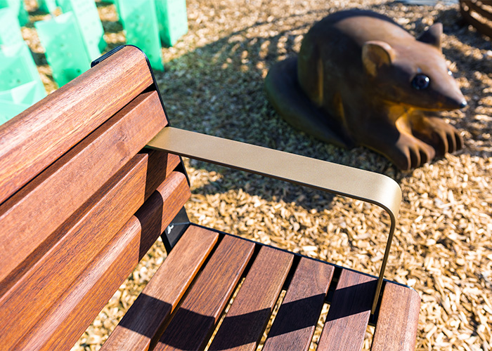 Linea Seat (LIS10, 2100mm) featuring eco-certified hardwood battens, tailored brass armrest, Night Sky frame.