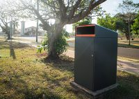 Escola Bin Enclosure (WBE-E240, 240L), powder coated in Textura Monument with Sensation Orange insert.