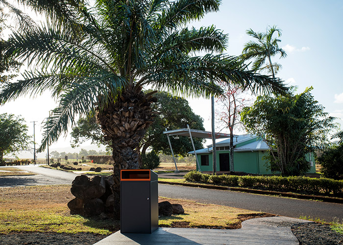 Escola Bin Enclosure (WBE-E240, 240L), powder coated in Textura Monument with Sensation Orange insert.
