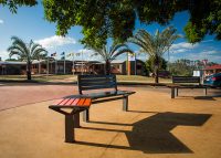 Aria Seating System (2S-C45-1B), powder coated in Textura Monument and Sensation Orange.