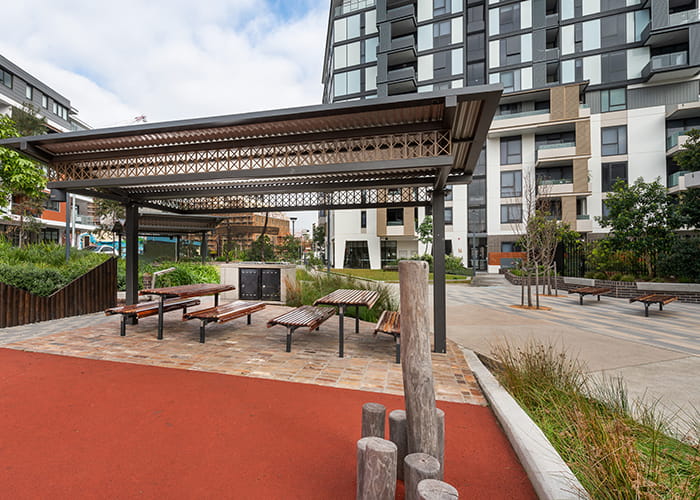 Classic Plaza Seats, Benches and Settings. Jarrah battens and Sable Bass frames. Photo: Christie Barbecues.