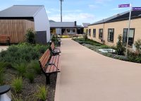 Park DDA Seats (PS7-DDA) with aluminium woodgrain Spotted Gum battens, Night Sky frames.