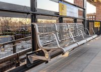 Concourse Seat (CML7, 4-seater) wall-fixed, Sable Brilliance panels, Palladium Silver frame.