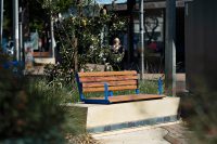 Linea Seat plinth-fixed with aluminium Spotted Gum battens, Jaybird Blue frames.