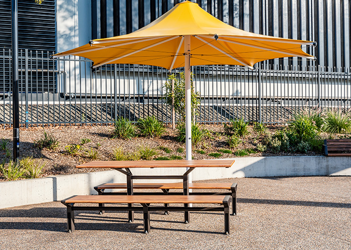 Aria DDA Setting (CMA6-DDA, 2100mm) with aluminium Spotted Gum battens, Textura Dark Bronze frame.