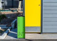 Custom dog litter bin, with Viper Green front panel, Textura Monument housing.