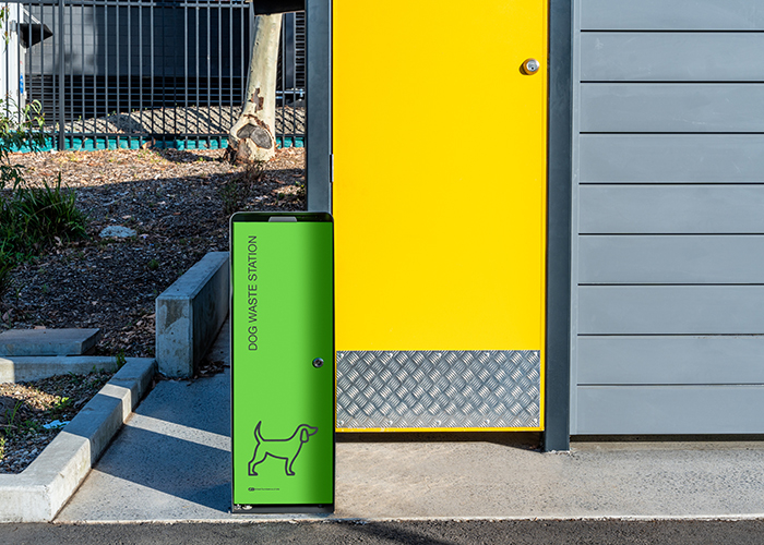 Custom dog litter bin, with Viper Green front panel, Textura Monument housing.