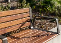 Aria Seating System (3S-3B) with aluminium Spotted Gum battens, Textura Dark Bronze frame.