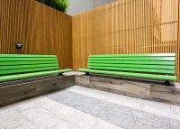 Plinth-mounted Mall Seats, in Viper Green.