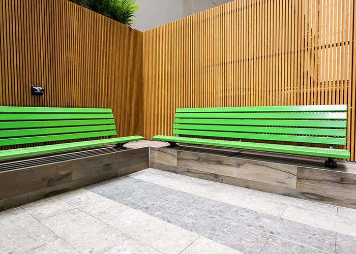 Plinth-mounted Mall Seats, in Viper Green.