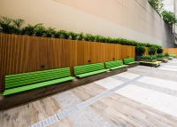 Plinth-mounted Mall Seats, in Viper Green.