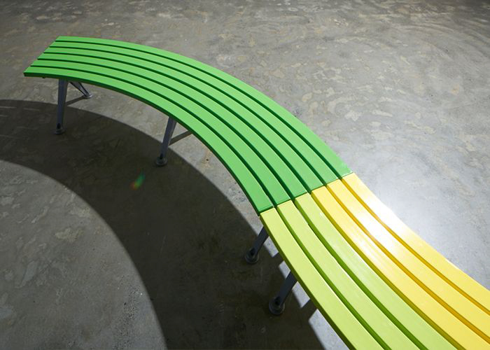 Mall Curved Slim Bench with Sable Brilliance frame, battens in Viper Green, Lycra Strip and Brilliant Yellow.