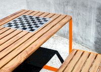 Linea Table (LIT10) with Linea Bench (LIB6) in aluminium Spotted Gum and Sensation Orange.
