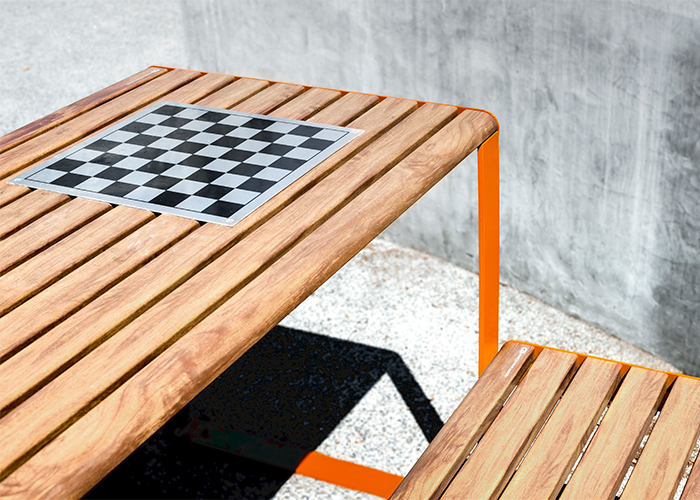 Linea Table (LIT10) with Linea Bench (LIB6) in aluminium Spotted Gum and Sensation Orange.