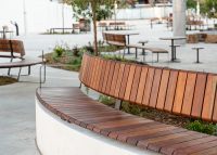 Linea VT Curved Seat (LVS10-C) convex, plinth-fixed with hardwood battens, Textura Dark Bronze frame.