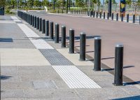 Wide Bollards - surface fixed, some removable, powdercoated in Sable Bass.