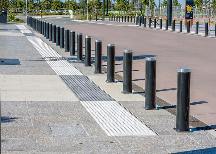 Wide Bollards - surface fixed, some removable, powdercoated in Sable Bass.