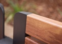 Aria Seat, woodgrain aluminium battens in Spotted Gum, frame in Textura Monument.