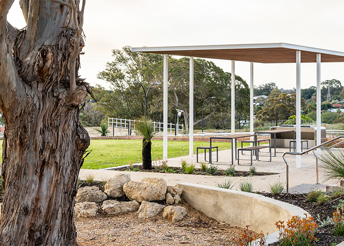 Linea Setting with Table (LIT10-DDA, 1800mm) and Benches (LIB6) with hardwood battens, Ironstone frame.