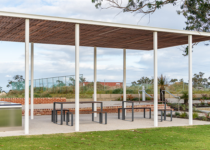 Linea Setting with Table (LIT10-DDA, 1800mm) and Benches (LIB6) with hardwood battens, Ironstone frame.