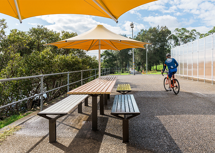 Aria Long Communal Table (CMA6-L) DDA in Doeskin, White, Deep Pool, Horizon Blue and Brilliant Yellow.