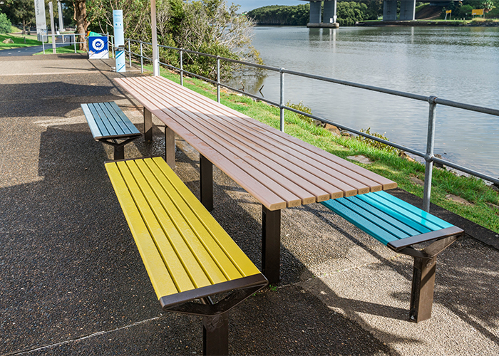Aria Long Communal Table (CMA6-L) DDA in Doeskin, White, Deep Pool, Horizon Blue and Brilliant Yellow.