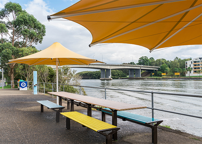 Aria Long Communal Table (CMA6-L) DDA in Doeskin, White, Deep Pool, Horizon Blue and Brilliant Yellow.