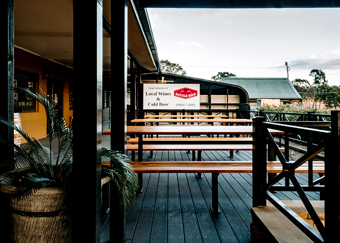 Park DDA Setting, battens in aluminium woodgrain Spotted Gum, frames in Textura Monument.