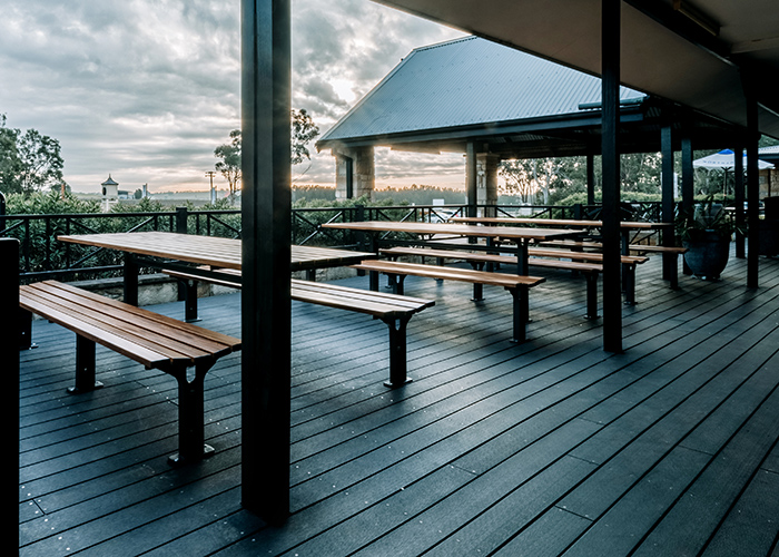 Park DDA Setting, battens in aluminium woodgrain Spotted Gum, frames in Textura Monument.