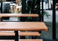 Park DDA Setting, battens in aluminium woodgrain Spotted Gum, frames in Textura Monument