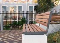Linea Seat (LIS10, 1500) plinth-fixed with aluminium Spotted Gum battens, Textura Woodland Grey frames.