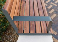 Linea Seat (LIS10, 1500) plinth-fixed with aluminium Spotted Gum battens, Textura Woodland Grey frames.