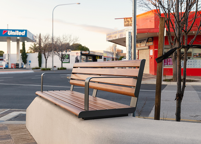 Linea Seat (LIS10, 1500) plinth-fixed with aluminium Spotted Gum battens, Textura Woodland Grey frames.