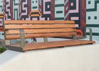 Linea Seat (LIS10, 1500) plinth-fixed with aluminium Spotted Gum battens, Textura Woodland Grey frames.