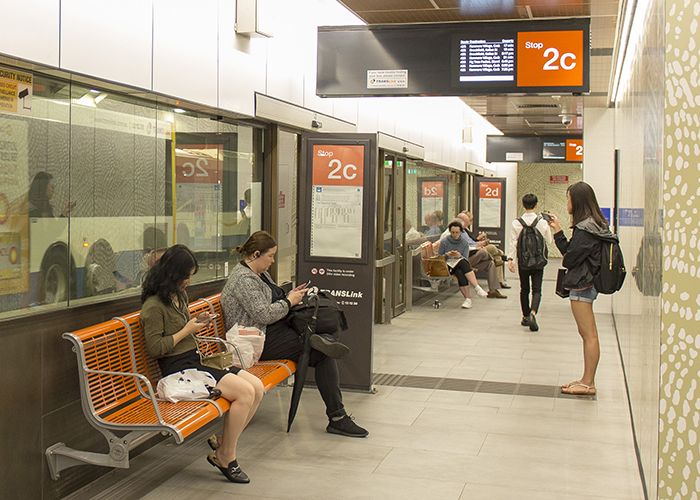 TransLink's bright orange Concourse Seats add warmth and comfort to the refurbished station.