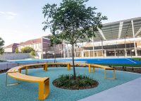 Tailored circular bench in Safety Yellow for the upgraded Randwick Public School campus.