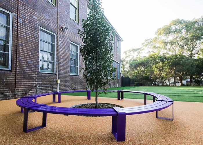 Tailored circular bench in Dark Violet for the upgraded Randwick Public School campus.