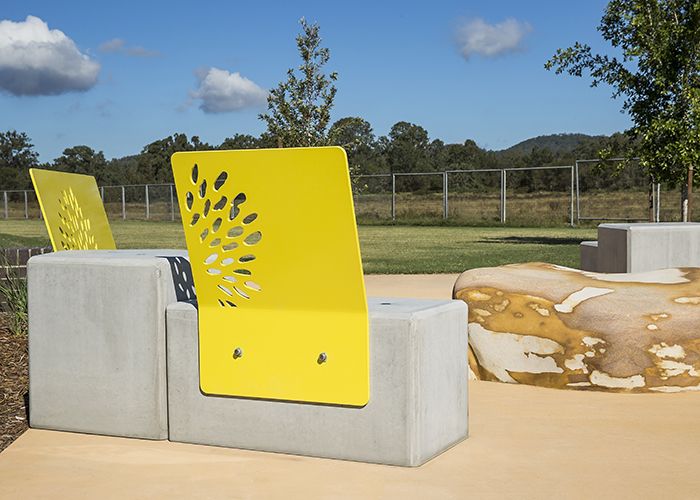 Powder coated panels are fixed to concrete plinths.